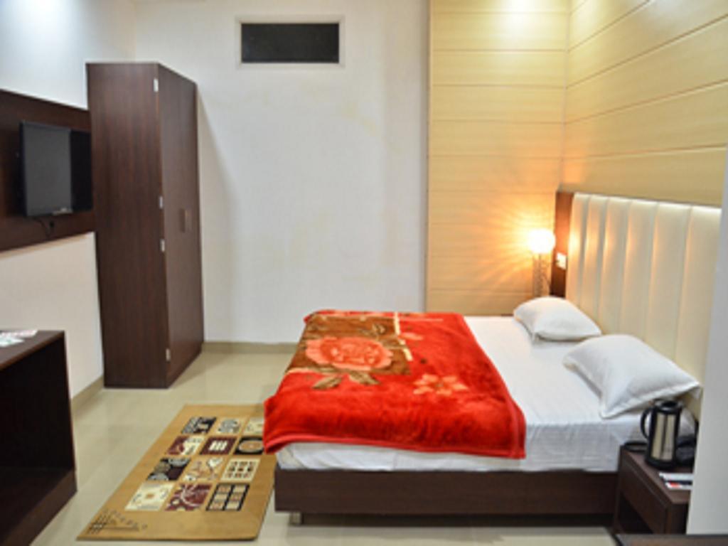 Hotel Popular Amritszár Szoba fotó