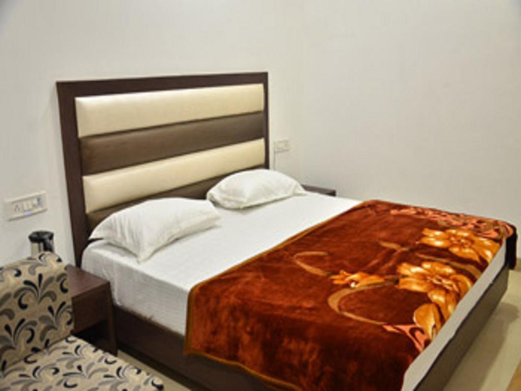 Hotel Popular Amritszár Szoba fotó